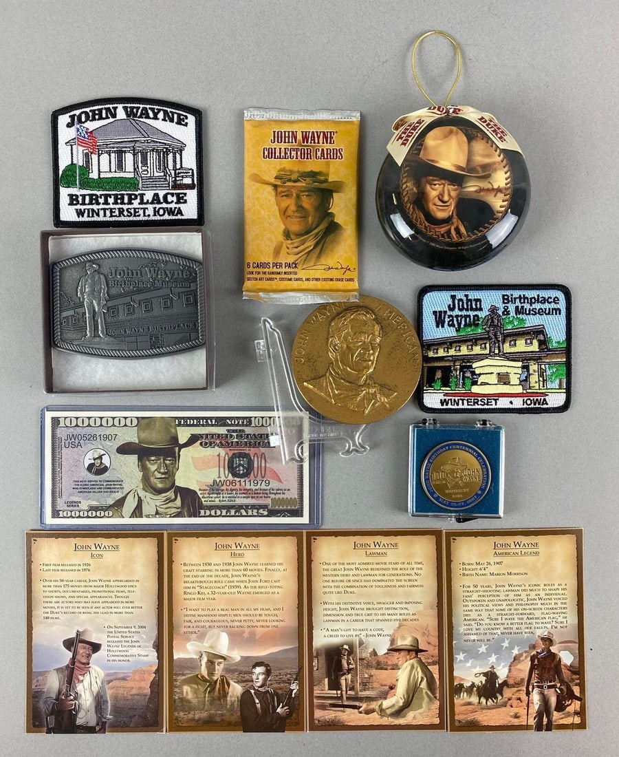 Group of 8 John Wayne Collectables and More: Includes ornament, patch, belt buckle and more. Largest item measures 2 1/2 x 1 x 2 1/2 inches.