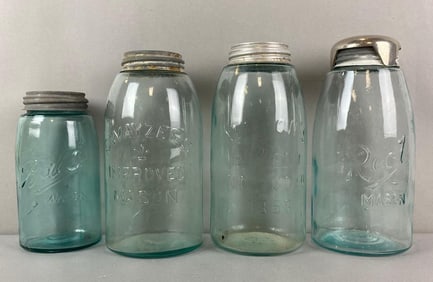 Group of 4 Blue Mason Jars with Lids