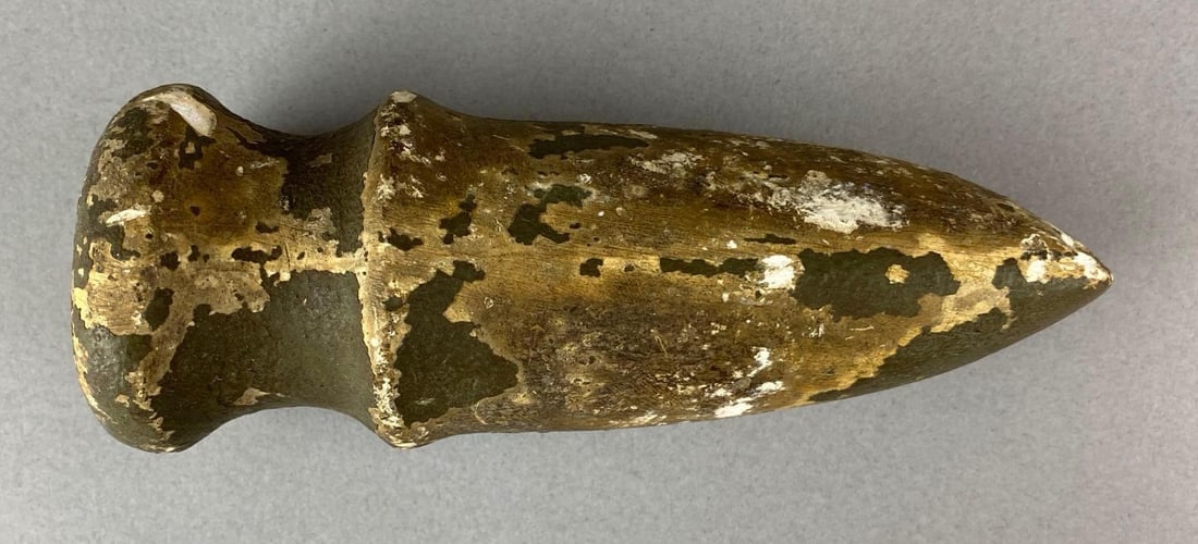Chalk Cast of an Ax Head Heike Collection: Marked with number 55 and LV. Does have chip on base. Measures 6 x 2 x 2 1/4 inches.