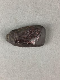 Miniature hematite celt