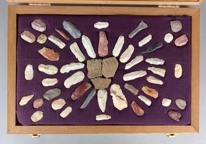 Frame full of flint scrapers and pottery shards