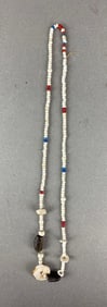 Strand of polished glass beads, Southern California