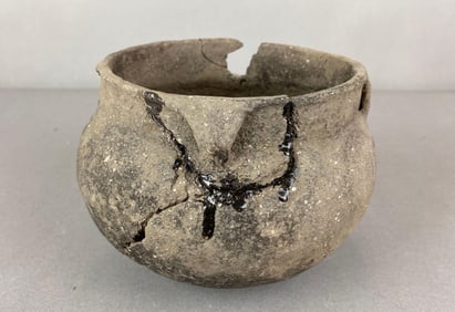 Pottery strap-handled bowl