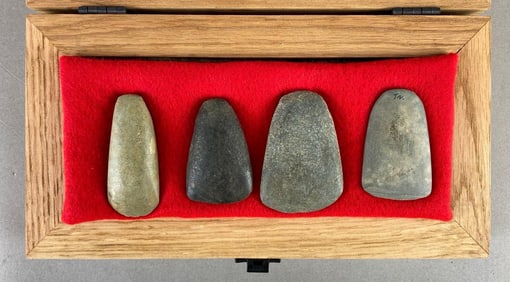 Frame of 4x miniature celts