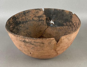 Pottery bowl with rim damage, Arkansas