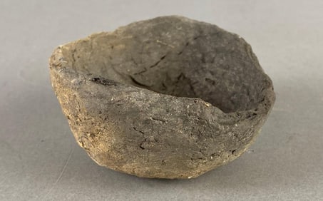 Small pottery bowl with rim damage, Arkansas