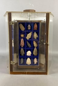 Rotating cigar display case filled with arrowheads from Marion County, Illinois
