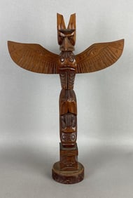 Wooden miniature totem pole