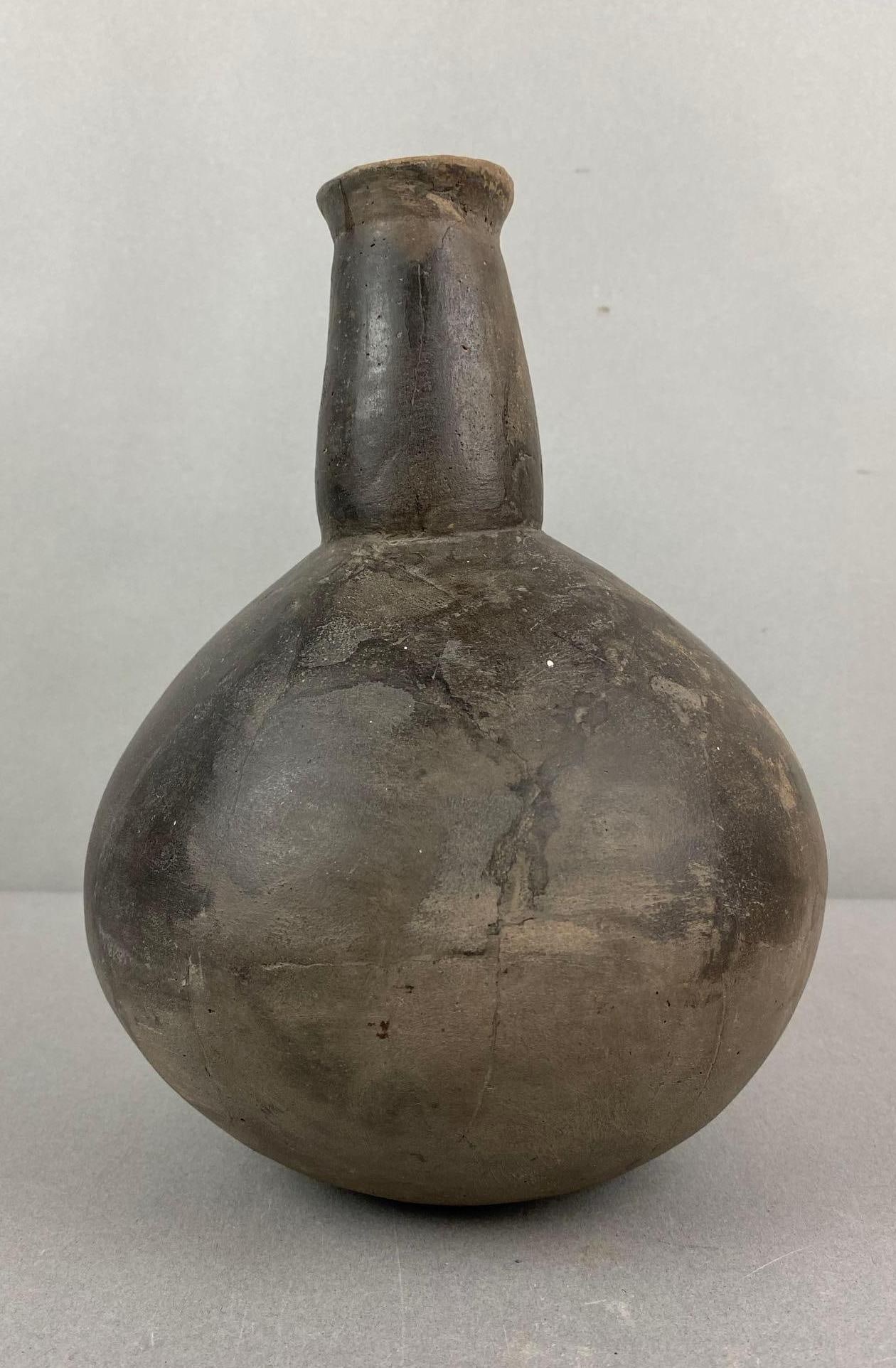 Mississippian Pottery Vase: Does have cracks. Measures 9 x 6 1/2 x 6 1/2 inches.
