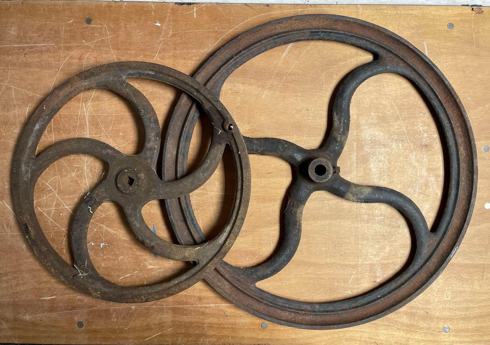 Group of 2 Antique Cast Iron Wheels: Largest measures 26 1/2 inches