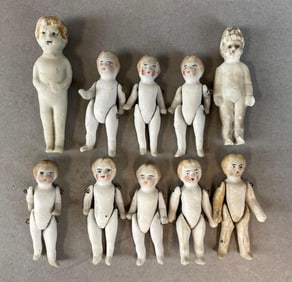 Group of Antique Bisque and Frozen Charlotte Dolls