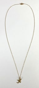 14 K Gold Chain and K Pendant.