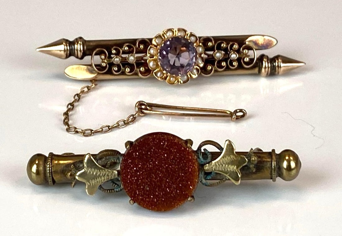 Group of 2 Gold Filled Brooches: includes Amethyst and Pearl Brooch, and goldstone nanny pin brooch, largest measures 2 1/4 inches wide
