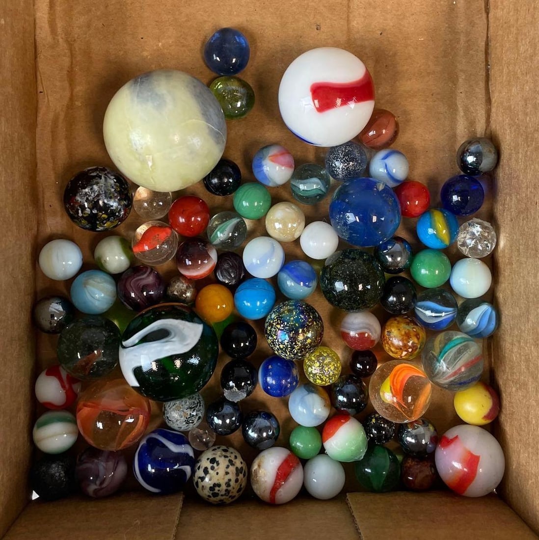 Group of 70+ Glass Marbles: Sizes range from 10-43 mm
