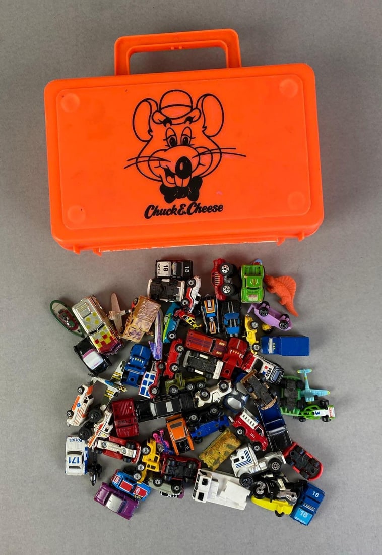Group of Vintage Micro Machines Vehicles and More: Includes Chuck E Cheese Case, dinosaur figurine, Mattel cars and more, case measures 8 x 6 1/2 x 2 1/2 inches