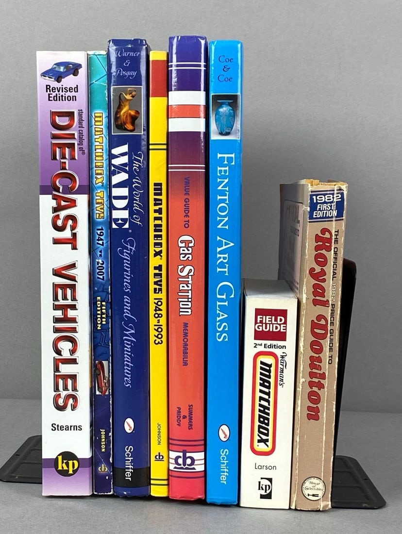 Group of Price Guide Books: Includes Fenton Art glass, Royal Doulton, matchbox and more, largest measures