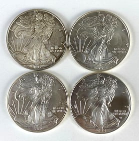 Group of 4 US $1 Silver Eagle Silver Dollars