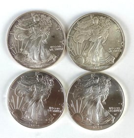 Group of 4 US $1 Silver Eagle Silver Dollars