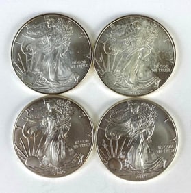 Group of 4 US $1 Silver Eagle Silver Dollars