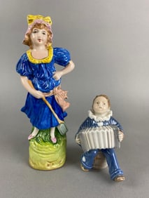 Group of 2 Porcelain Figurines