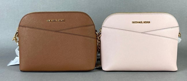 Group of the Michael Kors Dome Leather Purses