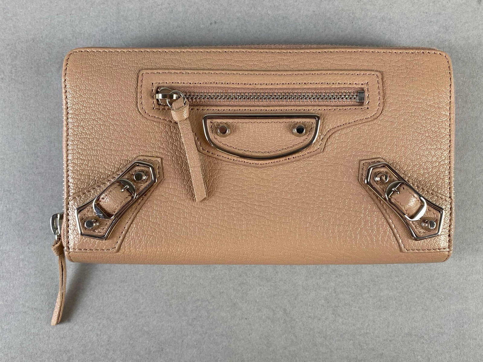 Balenciaga Rose des Sables Leather Wallet: With Authenticate First COA, Small stain on back, Measures 4 1/2 x 7 1/2 x 1 inches.