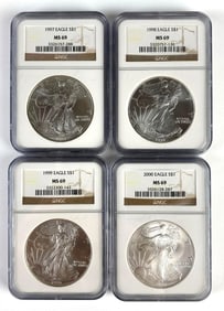 Group of 4 NGC Graded 1997-2000 US $1 Eagle Silver Dollars MS69