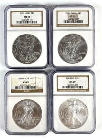 Group of 4 NGC Graded 2001-2004 US $1 Eagle Silver Dollars MS69