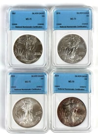 Group of 4 NNC Graded US $1 Silver Eagles MS70