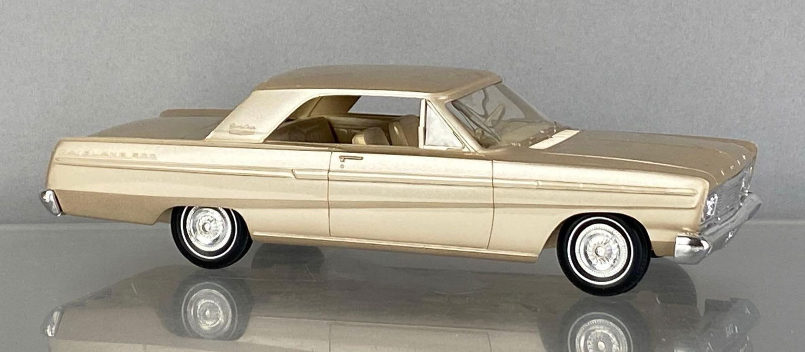 1965 Ford Fairlane 500 Beige Dealership Promo Car: coaster, scuff on roof, hood ornament not attached but includes