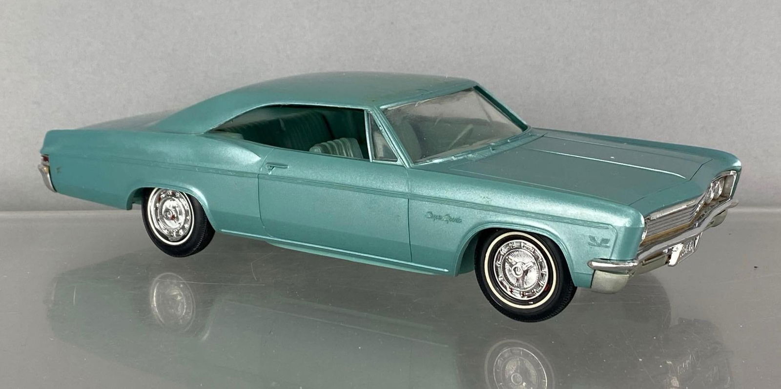 1966 Chevrolet Imapala SS Turquoise Dealership Promo Car: Coaster, scuff on roof