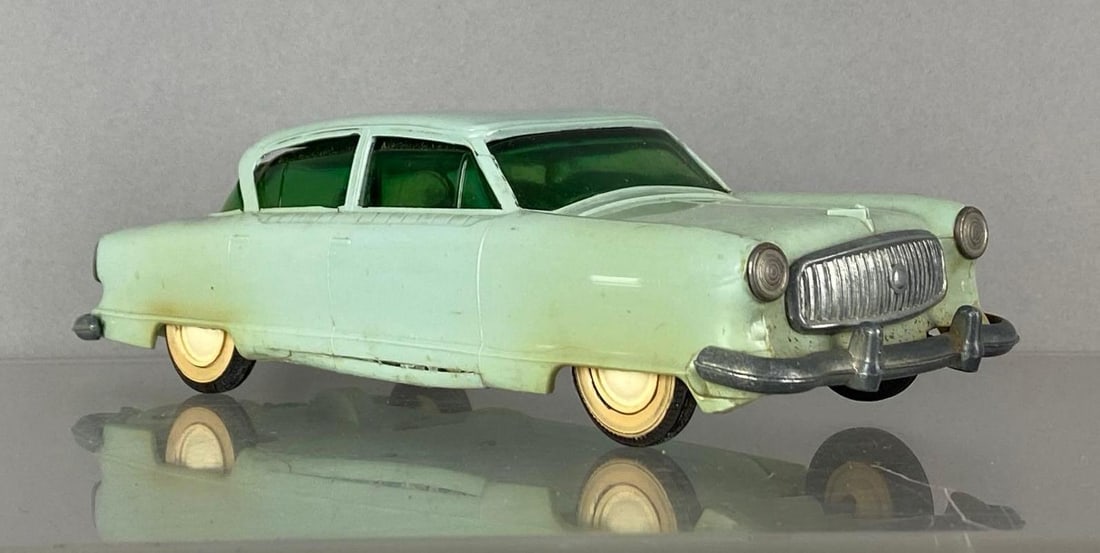 1953 Tru-Miniatures Nash Ambassador Light Blue Friction Dealership Promo Car: Friction jammed, discoloration and warping shown