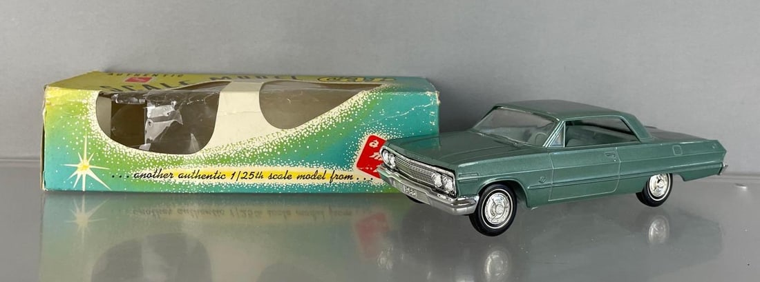 AMT 1963 Chevy Impala Hardtop Repainted Dealership Promo Car: Working friction, original packaging