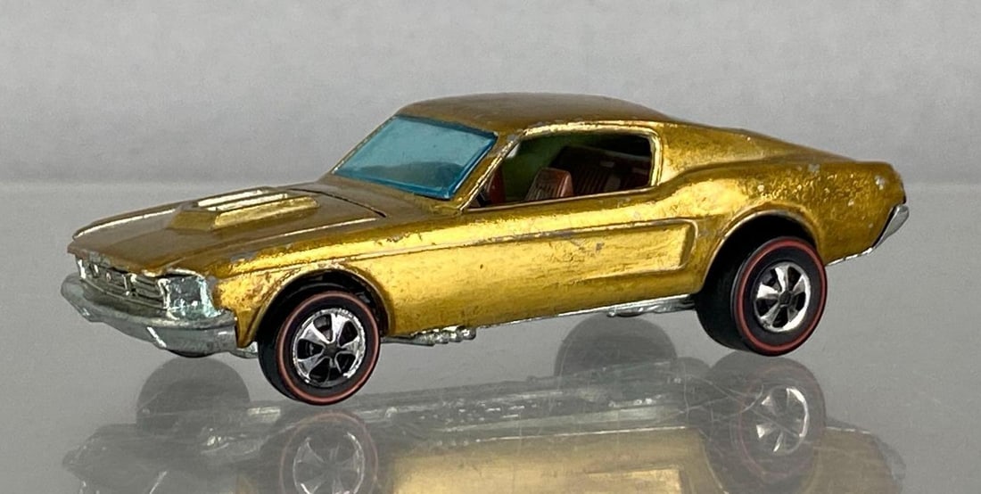 1967 Mattel Hot Wheels Red Line Custom Mustang: Die-cast, Redline tires, blue windows, spectra flame gold