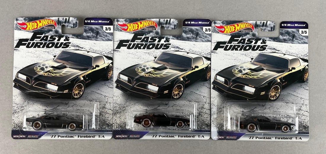 Group of Mattel Hot Wheels Fast and Furious 77 Pontiac Firebird T/As: 1/64 scale die-cast, original packaging