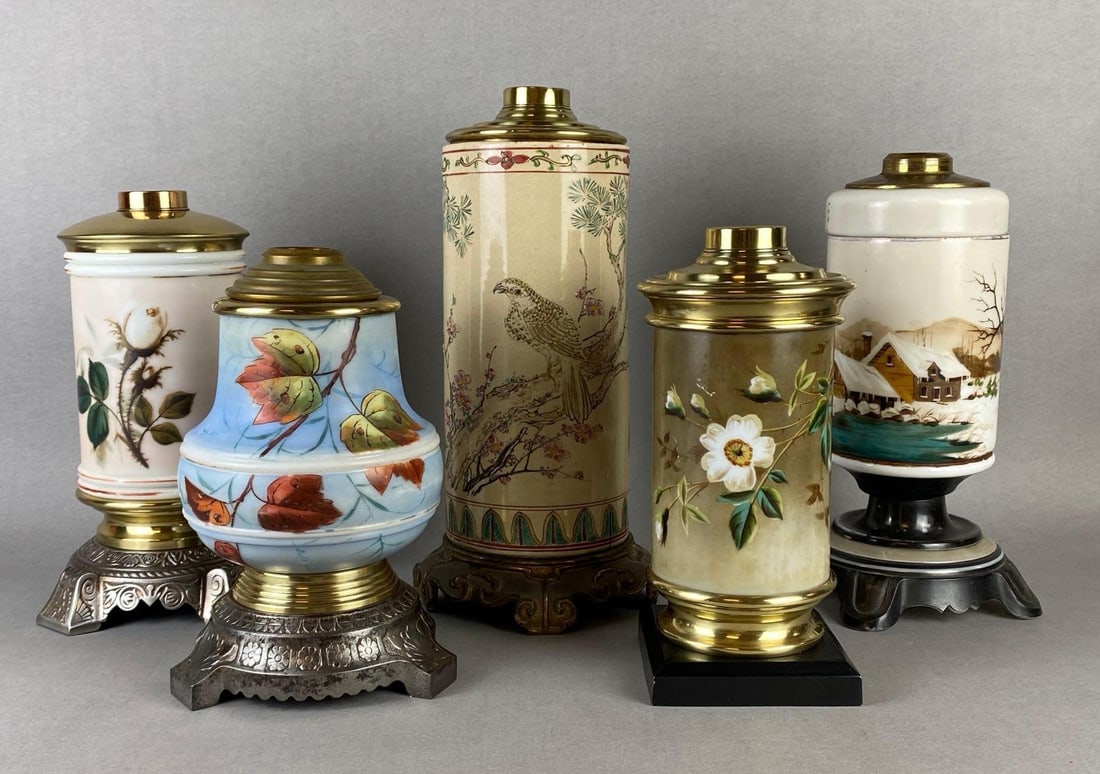 Group of 5 Antique Porcelain Painted Kerosene Oil Lamps: Includes floral and cabin painted designs, Tallest measures 14 x 6 1/2 x 6 1/2 inches.
