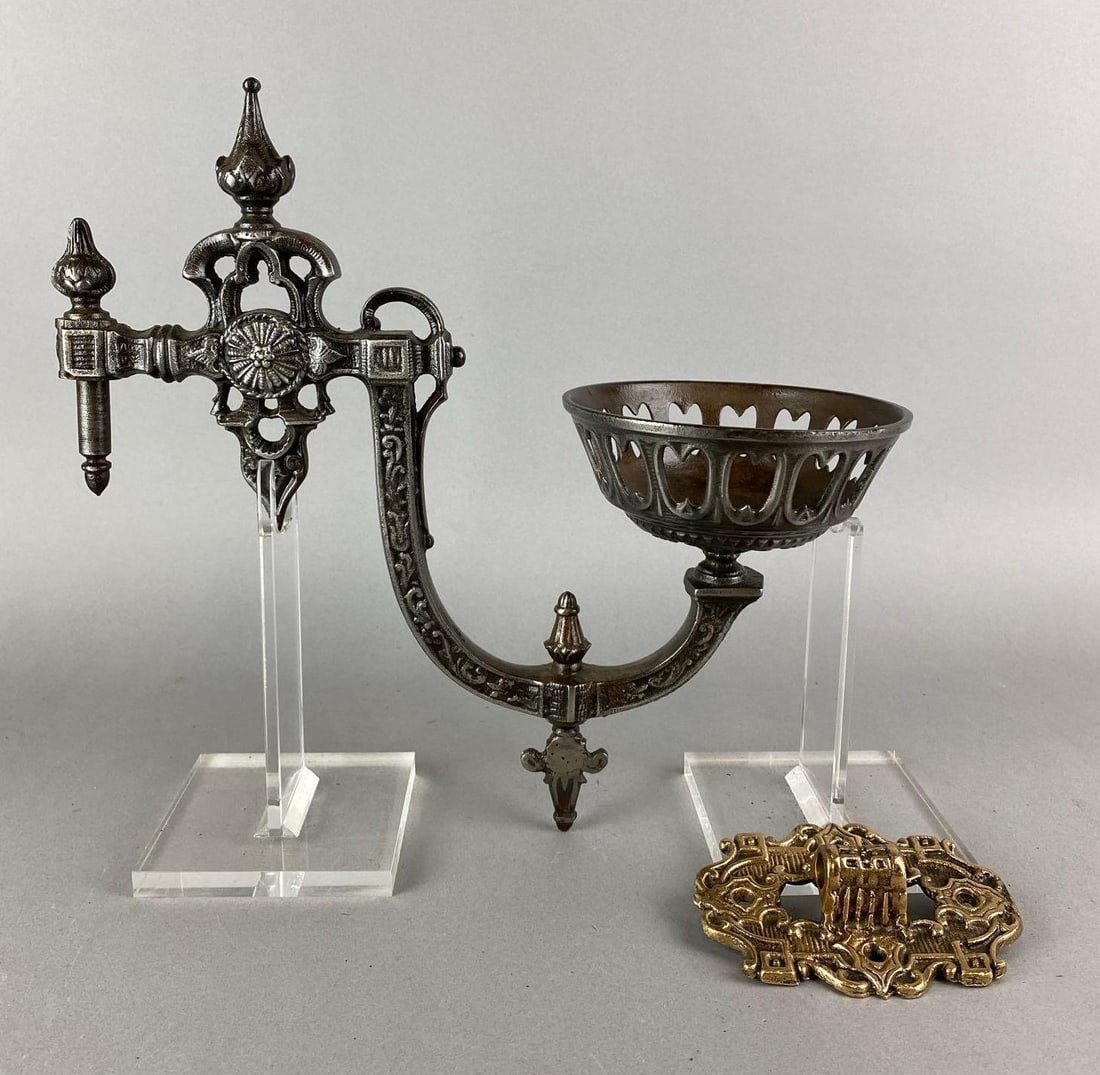 Antique Cast Iron Oil Lamp Wall Sconce: Mount hardware is a different color. Measures 13 x 5 1/2 x 13 1/4 inches.