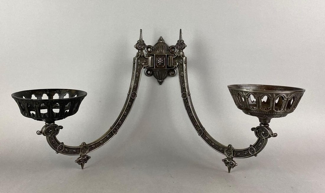 Antique Cast Iron Oil Lamp Wall Sconce: Holds 2 oil lamps. Has to different oil lamp holders. Measures 12 x 21 1/2 x 11 1/2 x