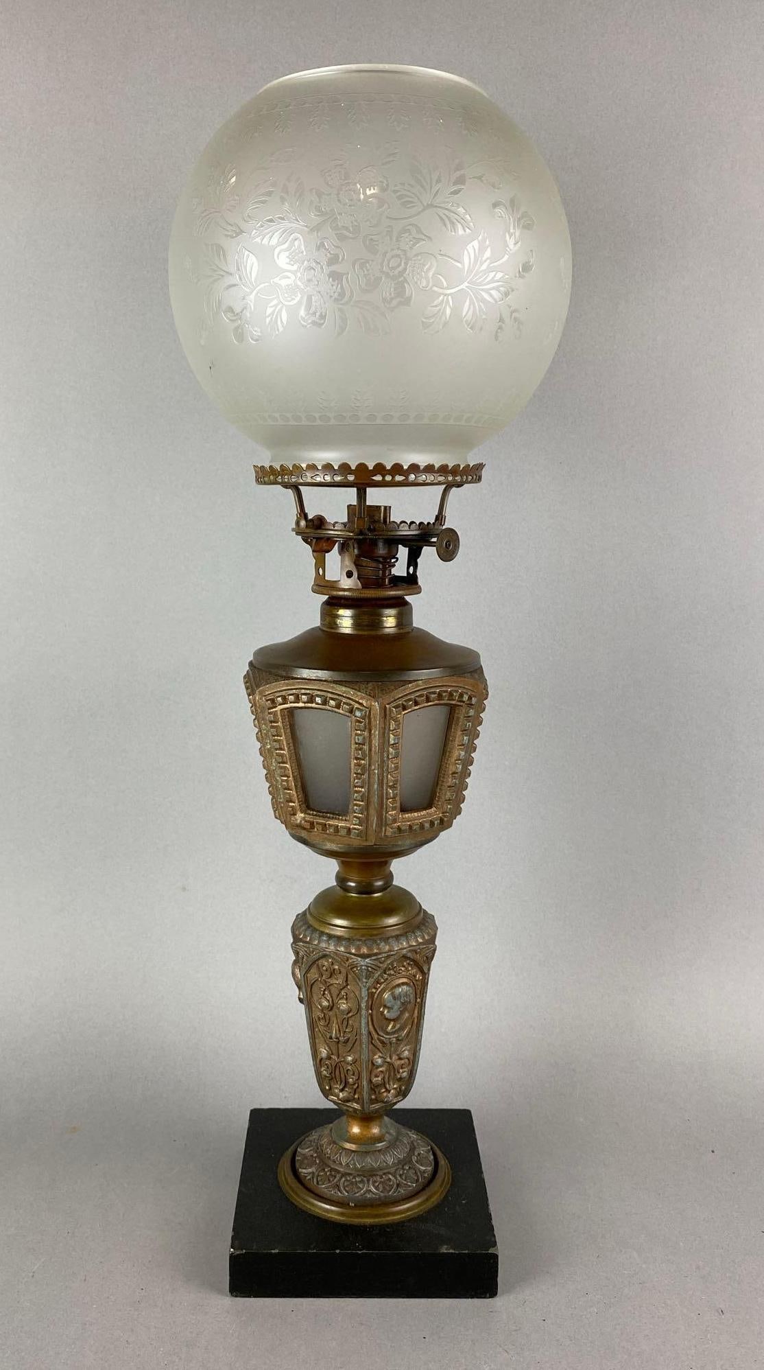 Antique Floral Motif Oil Lamp: Shade is floral etched glass. Does not include chimney. Measures 22 x 7 x 7 inches.