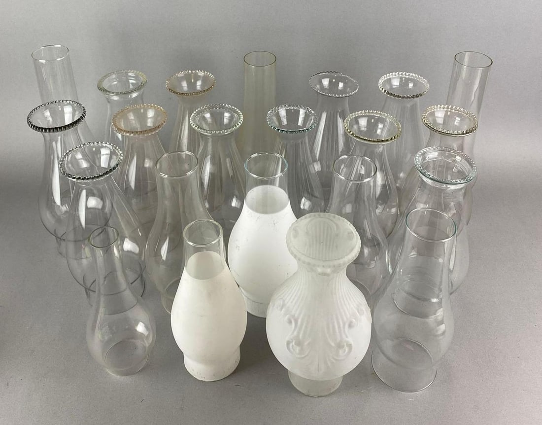 Group of Assorted Antique Oil Lamp Chimneys: Wear is consistent with age. Largest measures 10 x 4 1/2 x 4 1/2 inches.