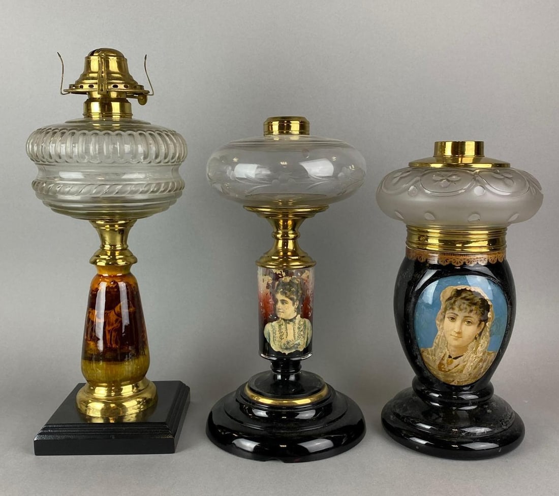 Group of 3 Assorted Antique Victorian Oil Lamps: 2 have crazing and one photo is crumbling. Largest measures 15 x 6 x 6 inches.