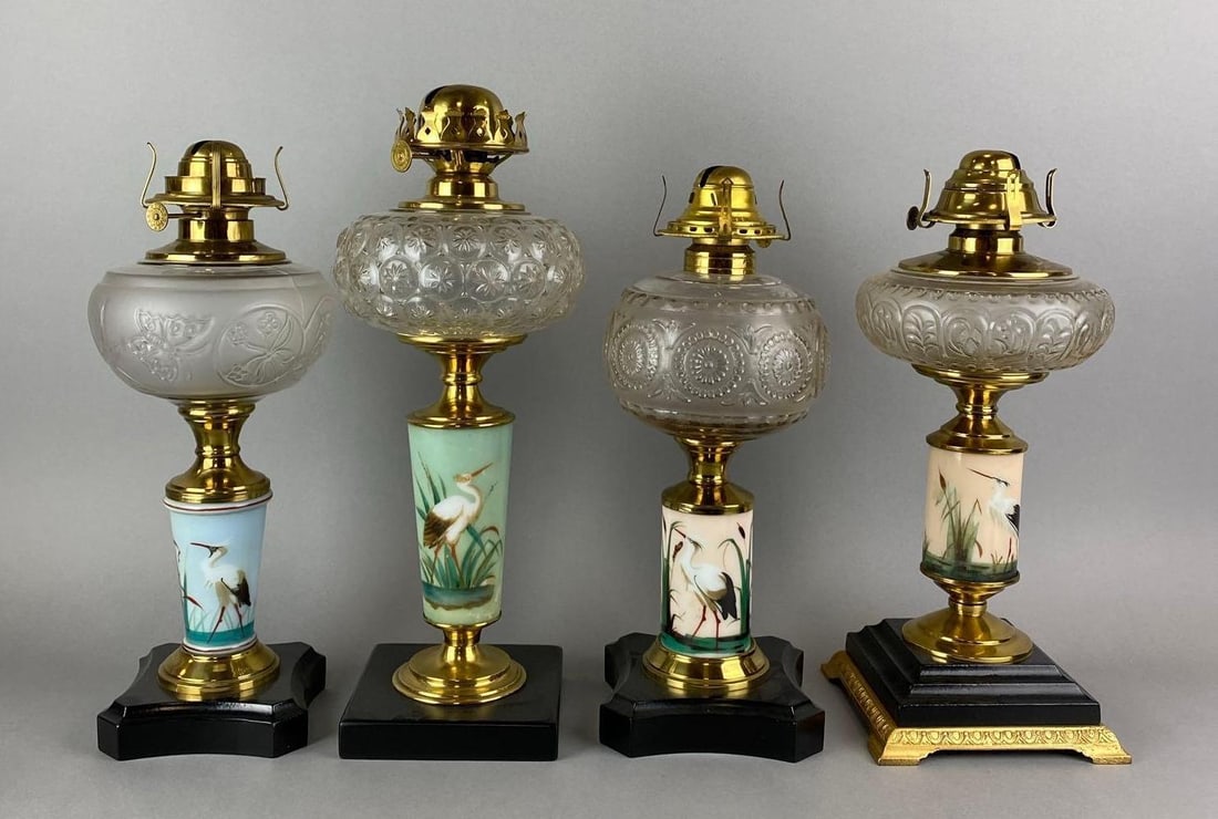 Group of 4 Antique Victorian Hand Painted Bird Motif Oil Lamps: Wear is consistent with age. Largest measures 14 x 7 x 7 inches.