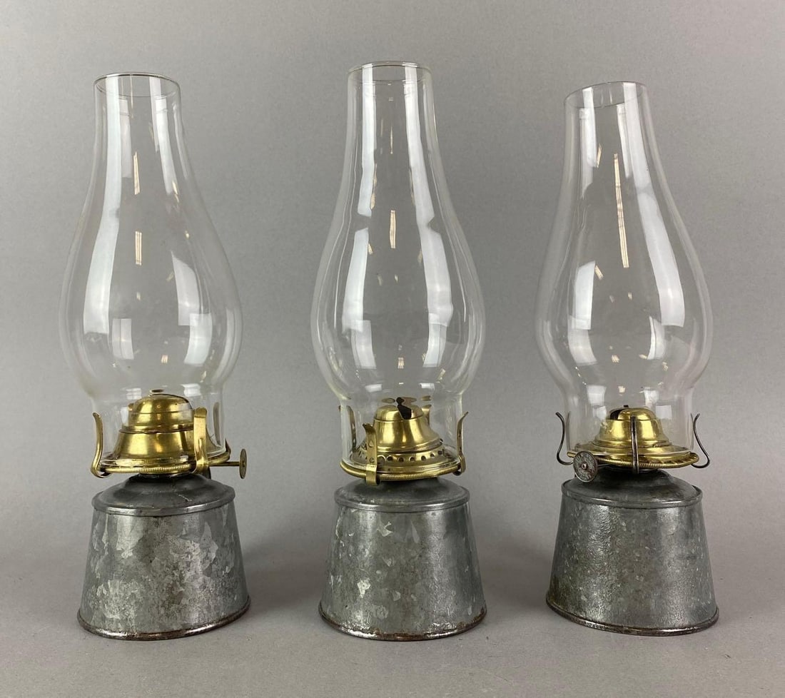 Vroup of 3 Antique Victorian Finger Lamps: One has a slight tilt. Largest measures 11 x 4 1/2 x 4 inches.