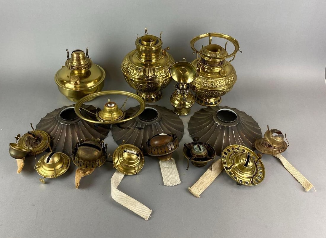 Group of Assorted Antique Brass Oil Lamp Items: Includes mini Oil Lamp with reflector, burner, Font and more. Largest item measures 9 x 6 1/2 x 6 1/2 inches.