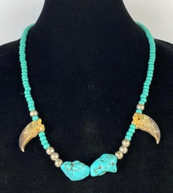 Handcrafted Beaded Turquoise Necklace with Bear Claws