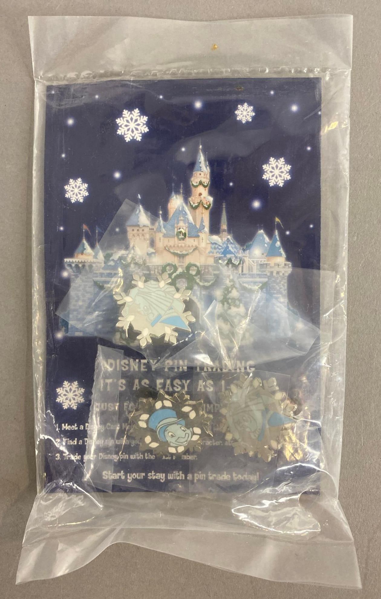 Group of 3 Disney Enamel Pins: Still in original packaging. Includes Jiminy Cricket, Flora and Fauna. Largest pin measures