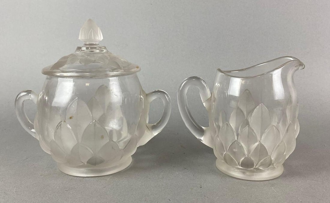 Antique Fostoria Glass Company Frosted Artichoke Sugar and Creamer: Pattern number Valencia No. 205. Lid has a chip. Largest item measures 6 1/2 x 7 x 4 3/4 inches.