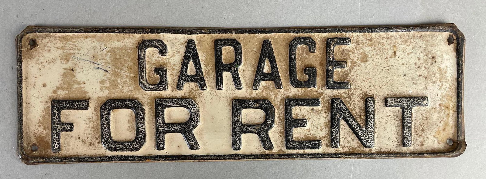 Vintage Embossed Metal Garage for Rent Sign: Measures 3 1/2" x 12"