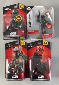Group of 4 Disney Star Wars Figurines