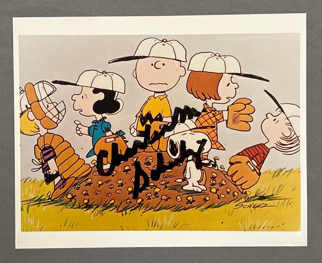 Signed Charles Schulz Photograph: unknown authenticity, no COA, buying as is. 8" x 10"